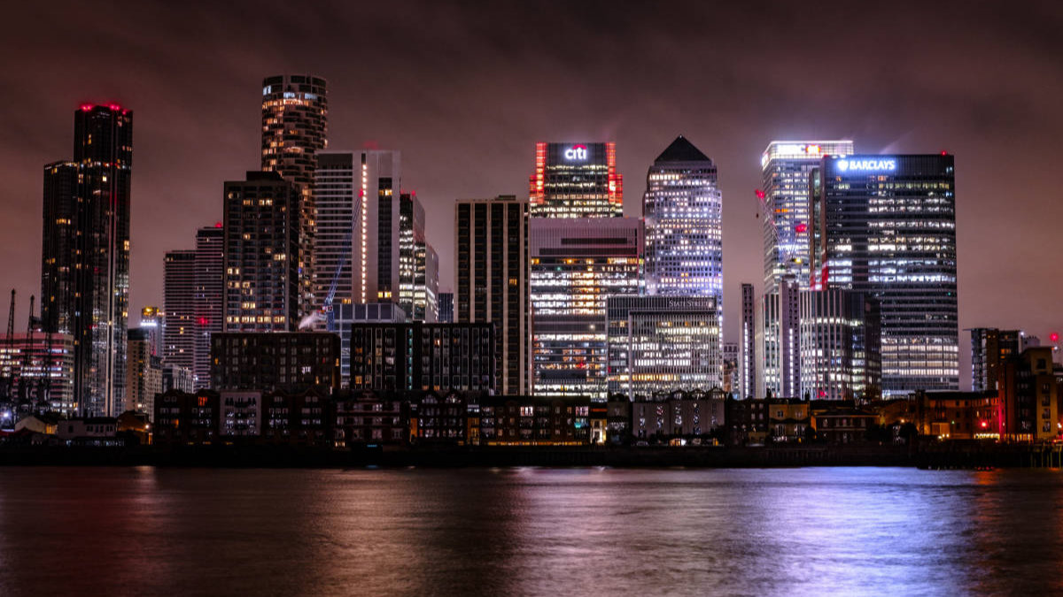 nighttime view of Canary Wharf in London